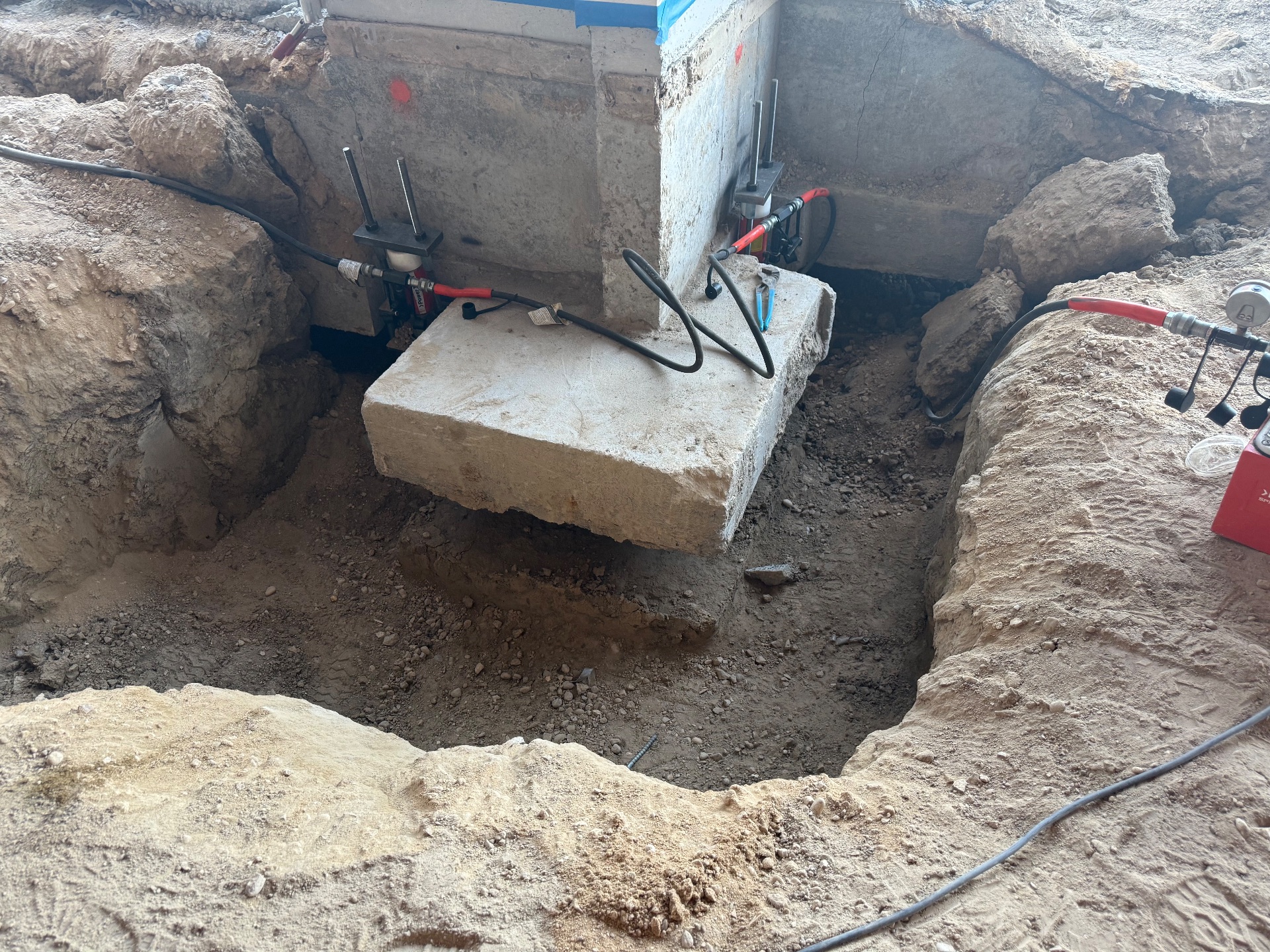 The foundation before we inject structural grade polyurethane foam to help support the piered foundation.