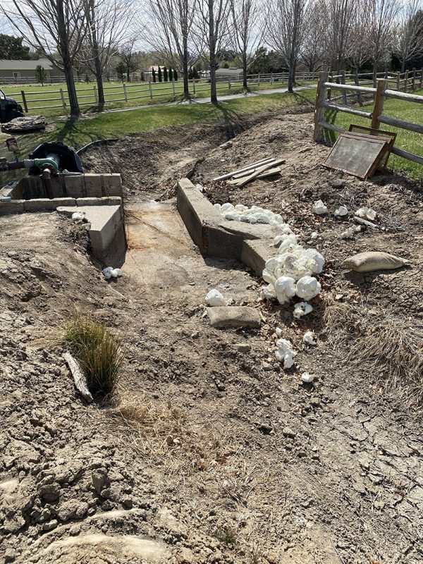 weir-area washout and void-fill work (image 2)
