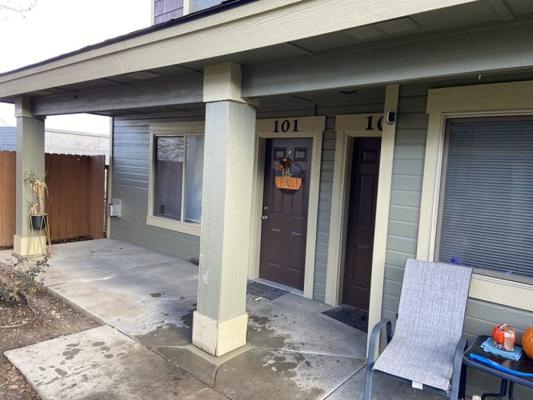 apartment porch pillar and settled concrete repair area (image 11)