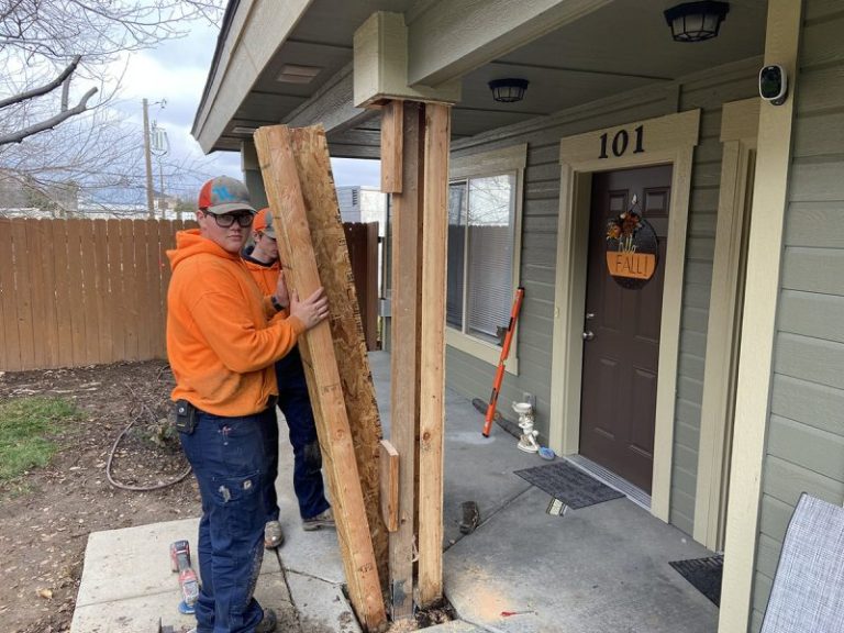 apartment porch pillar and settled concrete repair area (image 7)