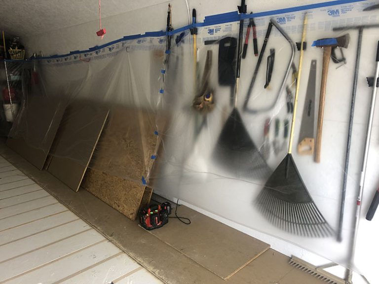 Protected tools and wall inside the shed