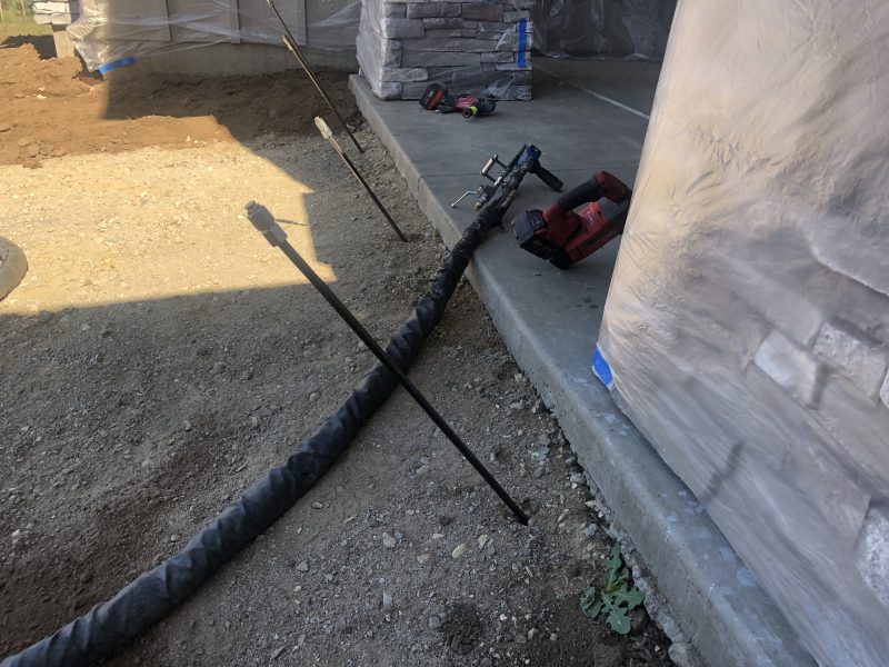 front porch pillars and concrete-entry work (image 7)