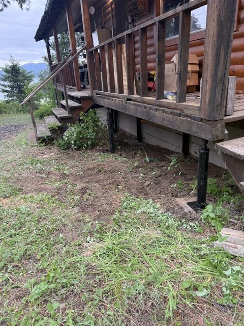house crawl-space supports and adjacent deck (image 5)