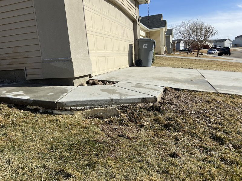 settled residential sidewalk panels (image 4)