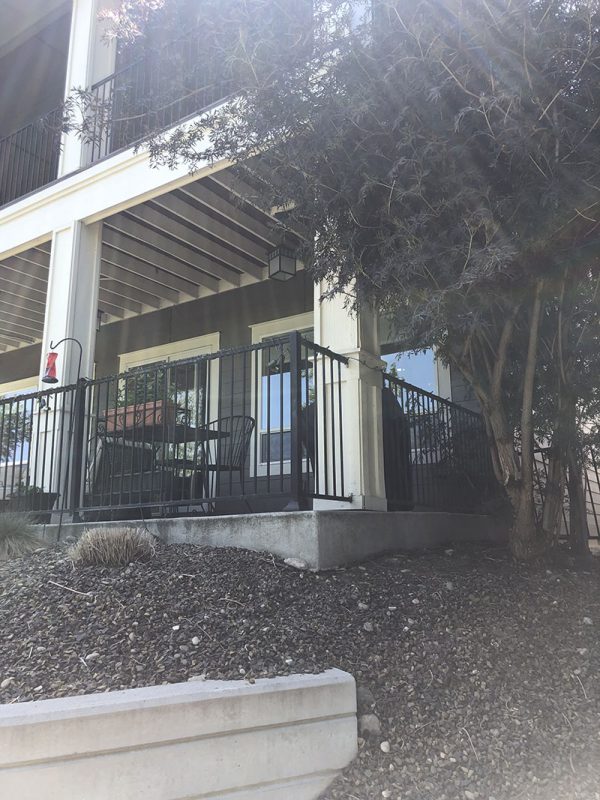 two-story home and covered back patio (image 2)