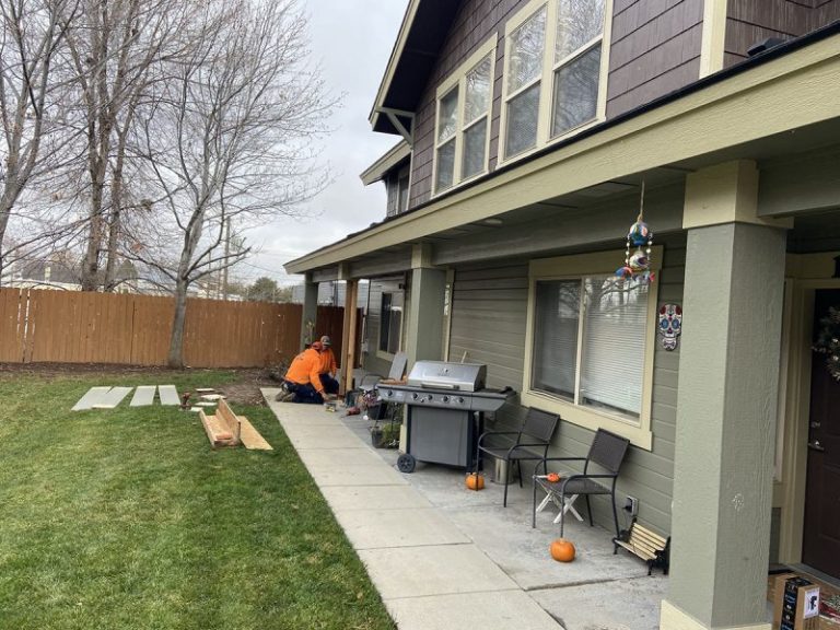 apartment porch pillar and settled concrete repair area (image 3)