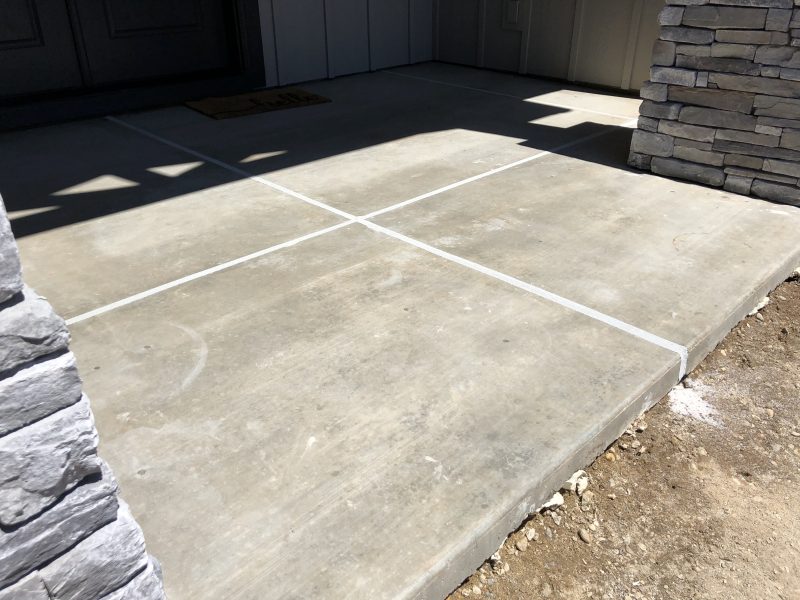 front porch pillars and concrete-entry work (image 6)