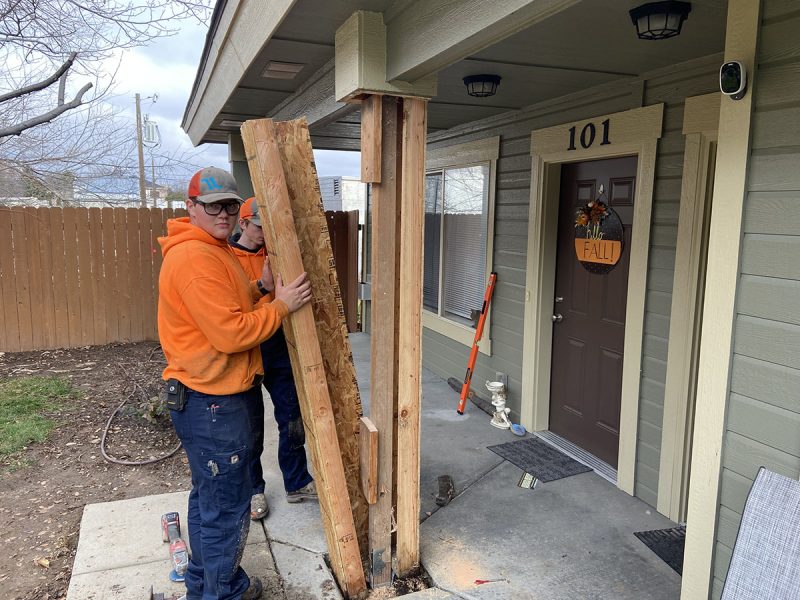 apartment porch pillar and settled concrete repair area (image 1)