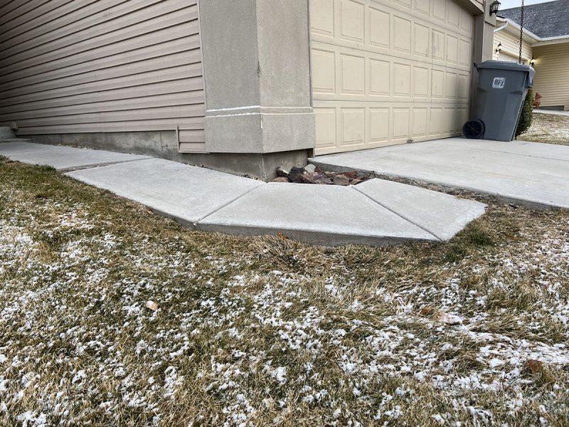 settled residential sidewalk panels (image 3)