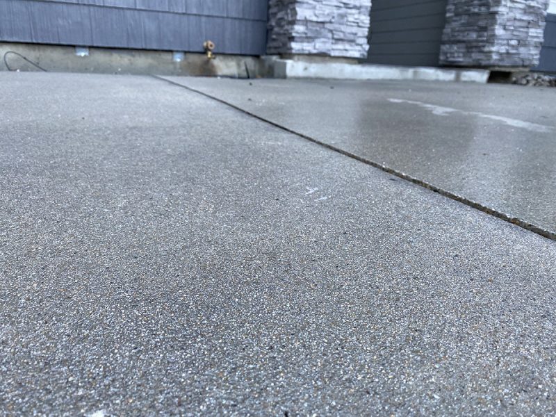 settled residential sidewalk panels (image 6)
