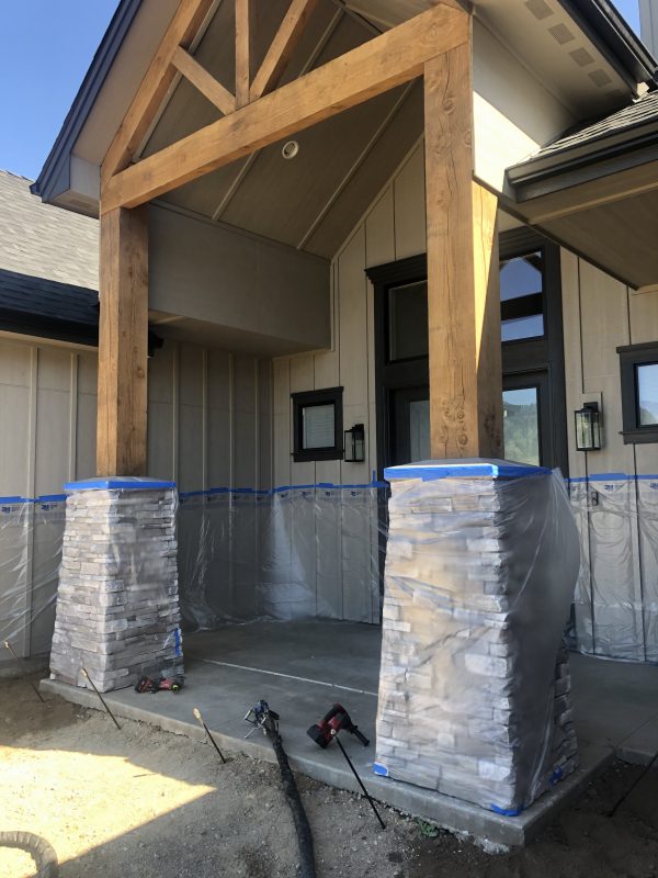 front porch pillars and concrete-entry work (image 10)