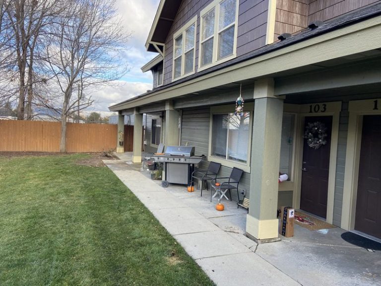 apartment porch pillar and settled concrete repair area (image 10)