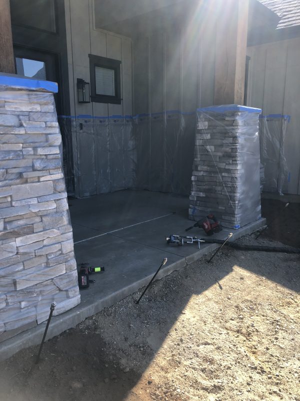 front porch pillars and concrete-entry work (image 11)