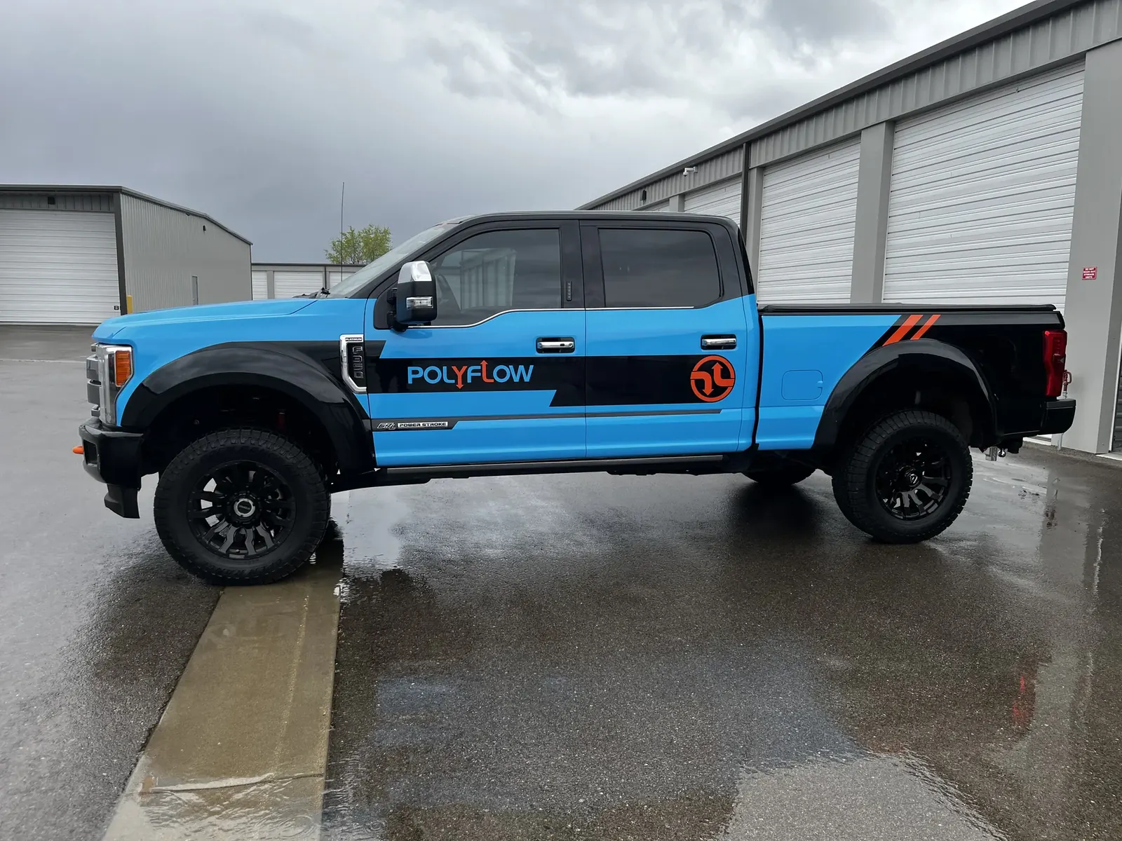 Polyflow wrapped service pickup truck, side view